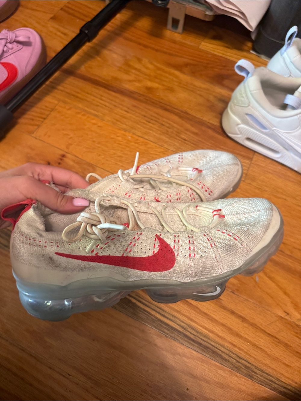 Nike Women's Cream Flyknit Sneakers with Red Swoosh
